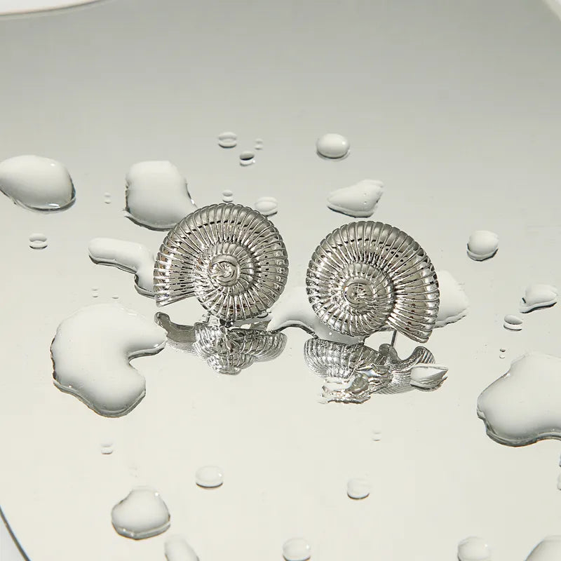 Cercei din oțel cu scoici - w040