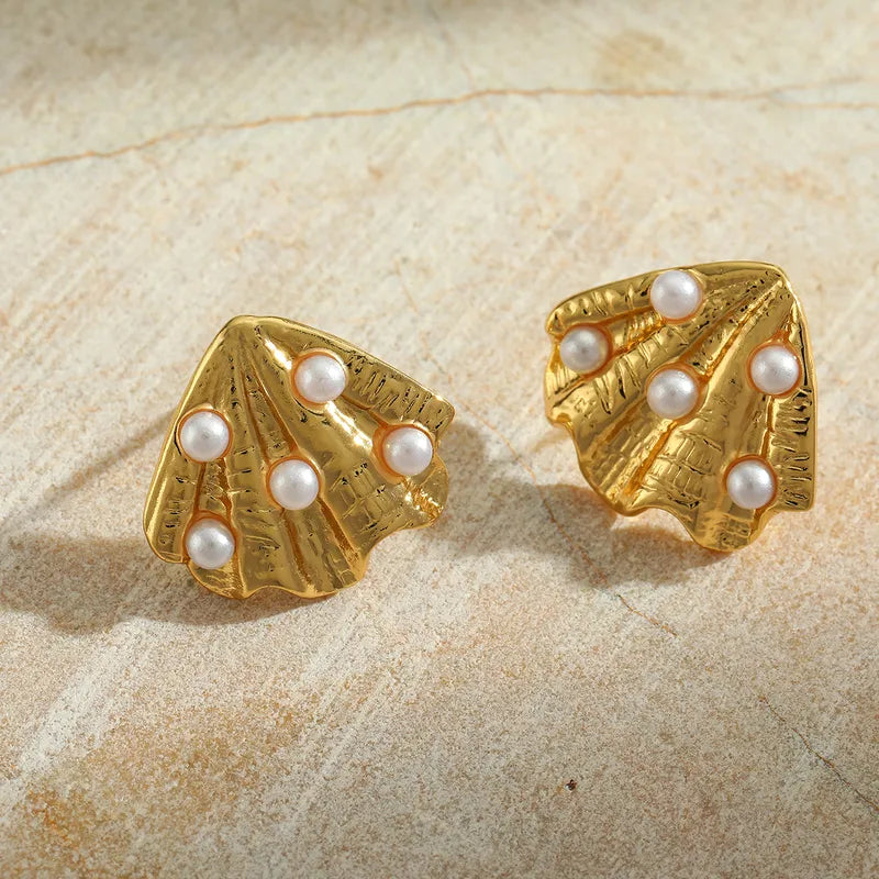 Σκουλαρίκια ατσάλινα χρυσά με πέρλα - w463