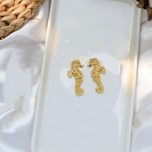 *Earrings gilded steel small hippocampus