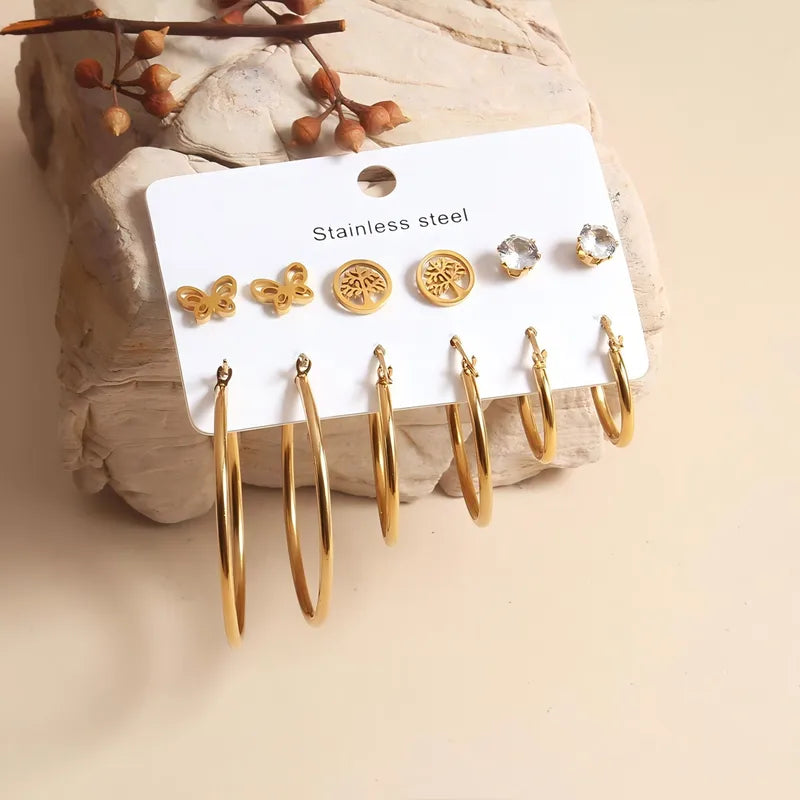 Conjunto de brincos de aço - W054