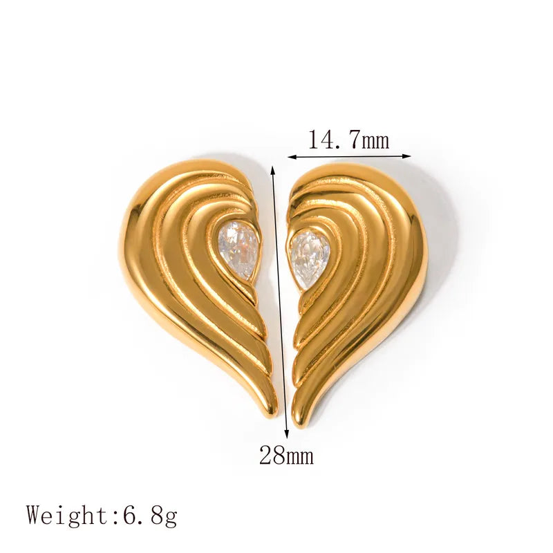 Brincos de aço dourado com zircão meio coração-ea559