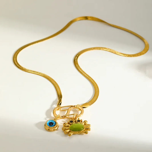 Κολιέ επιχρυσωμένο ατσάλι με καβούρι και μάτι - NE662