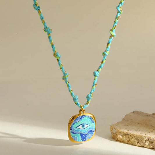 Κολιέ επιχρυσωμένο ατσάλι και σχοινί με μάτι - NE710