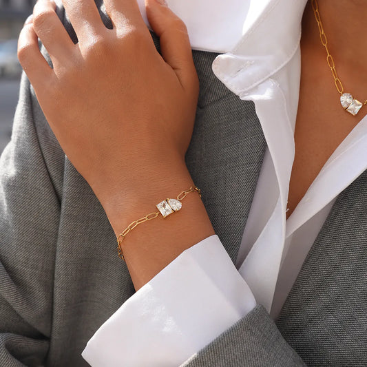 Βραχιόλι επιχρυσωμένο ατσάλι με δύο zircon - BR479