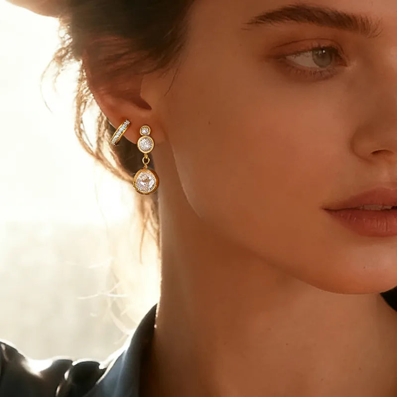 Σκουλαρίκια επιχρυσωμένο ατσάλι με τρια zircon-EA122