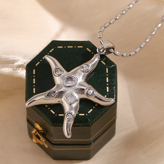 Κολιέ ατσάλι με αστερία και zircon- NE553