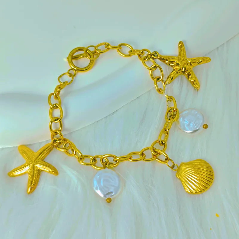 Βραχιόλι επιχρυσωμένο ατσάλι με κοχύλια - BR468