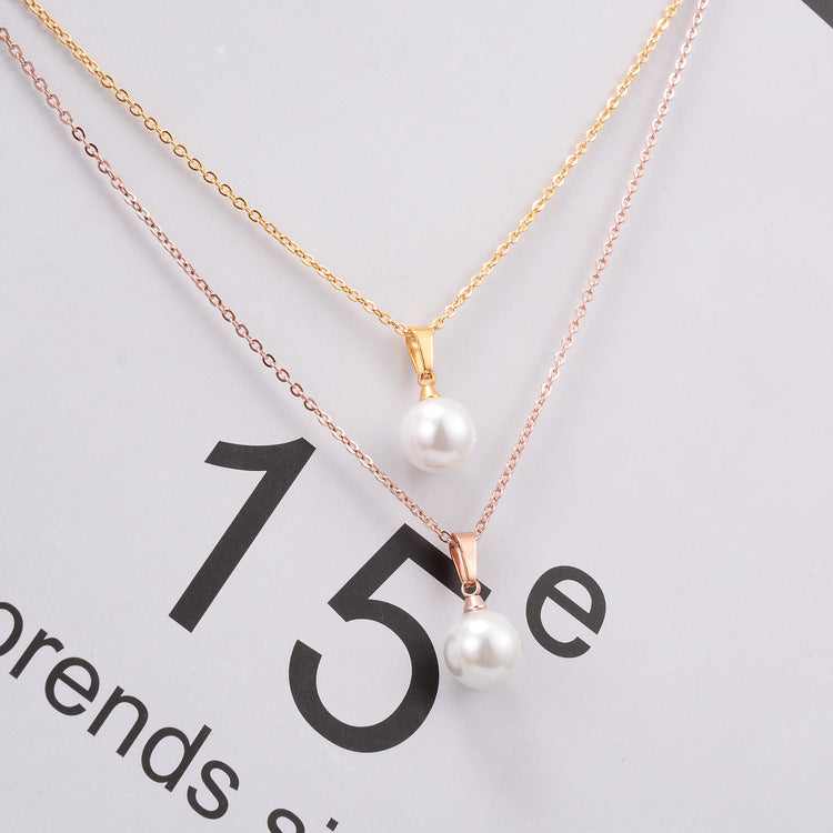Collier en acier plaqué or avec une perla-NE083 simple