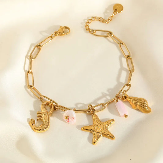 Bratara din otel placat cu aur cu stea de mare si scoici -