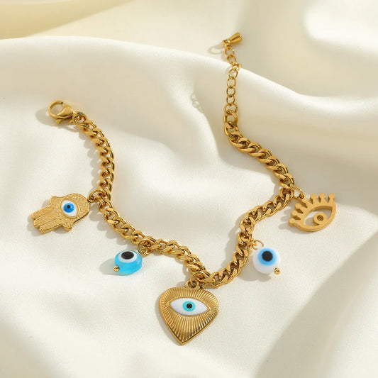 Bracelet acier doré avec symboles oculaires-BR285