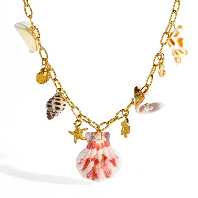Collar de acero con concha roja y dijes - NE635