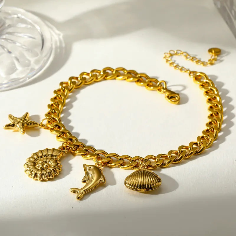 Βραχιόλι ατσάλινο με δελφίνι και κοχύλια-BR134