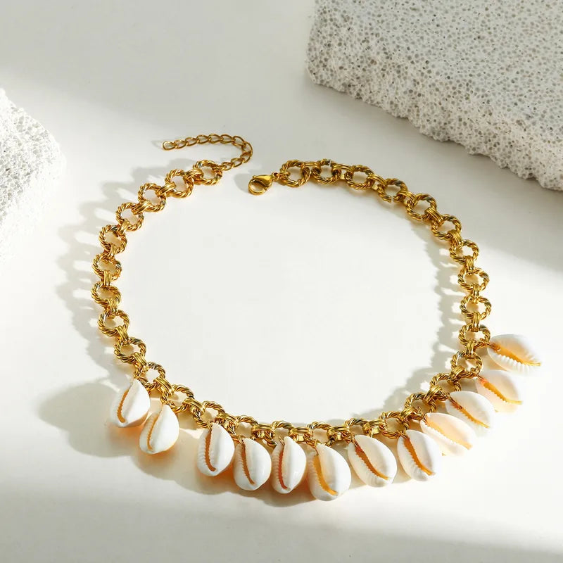 Collar de acero y oro con conchas - NE645