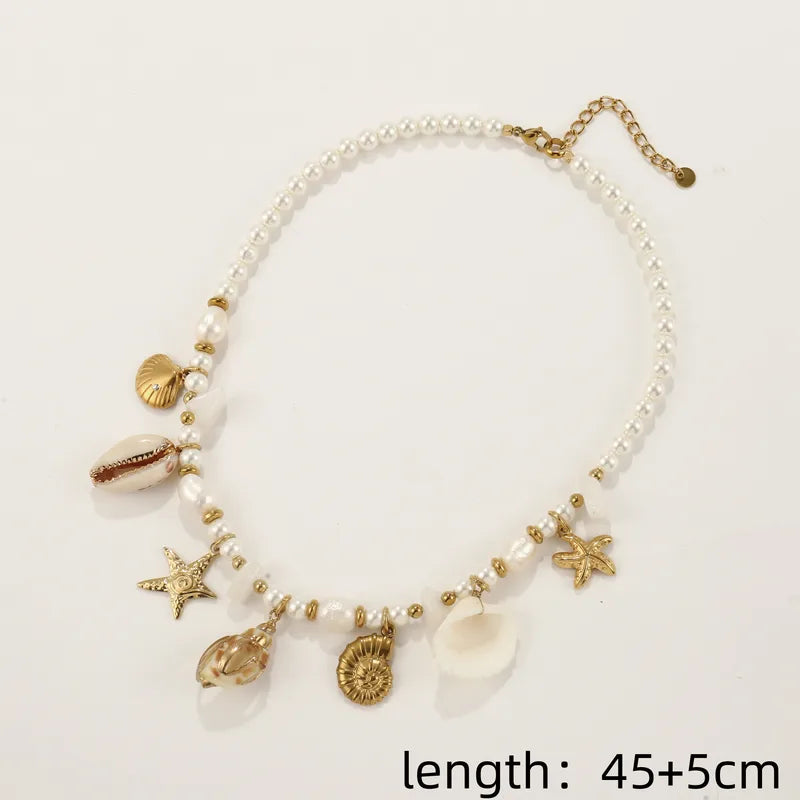 Colier din oțel auriu cu perle și scoici-