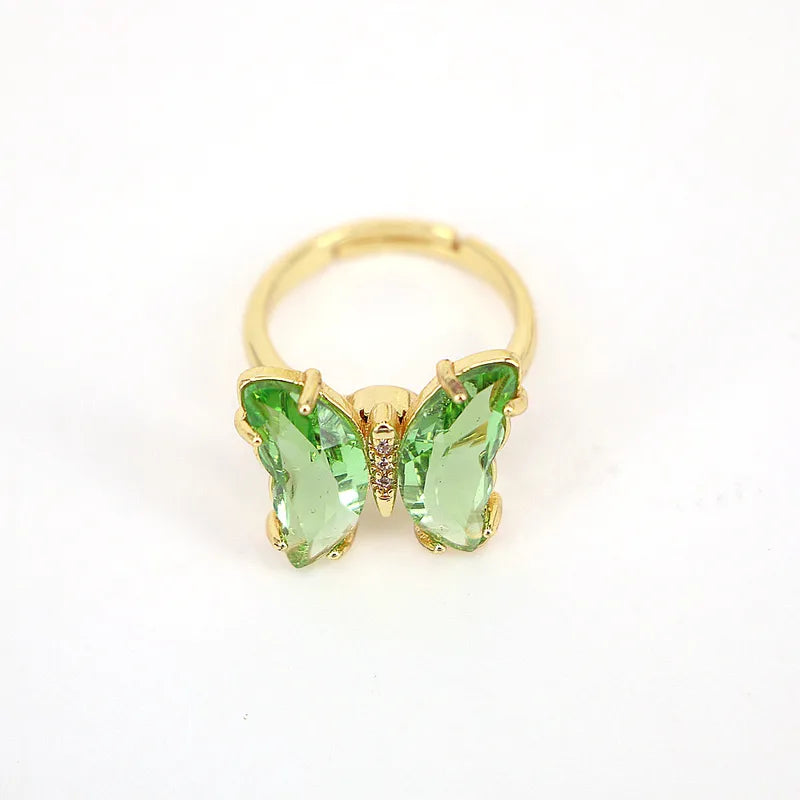 Brass ring with green butterfly - w075