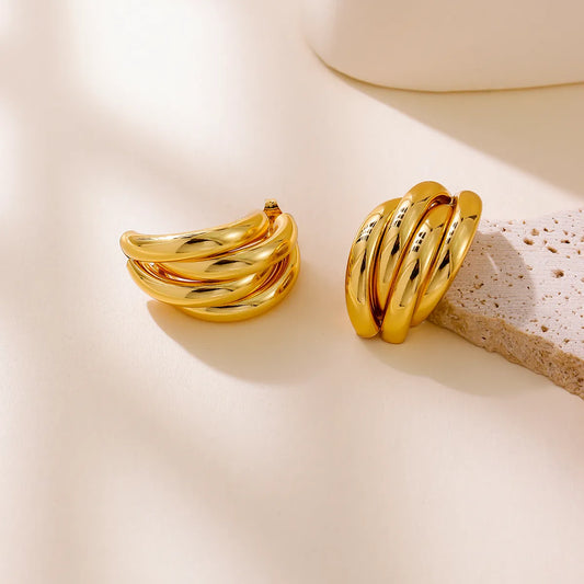 Σκουλαρίκια επιχρυσωμένο ατσάλι με καμπύλες - EA698