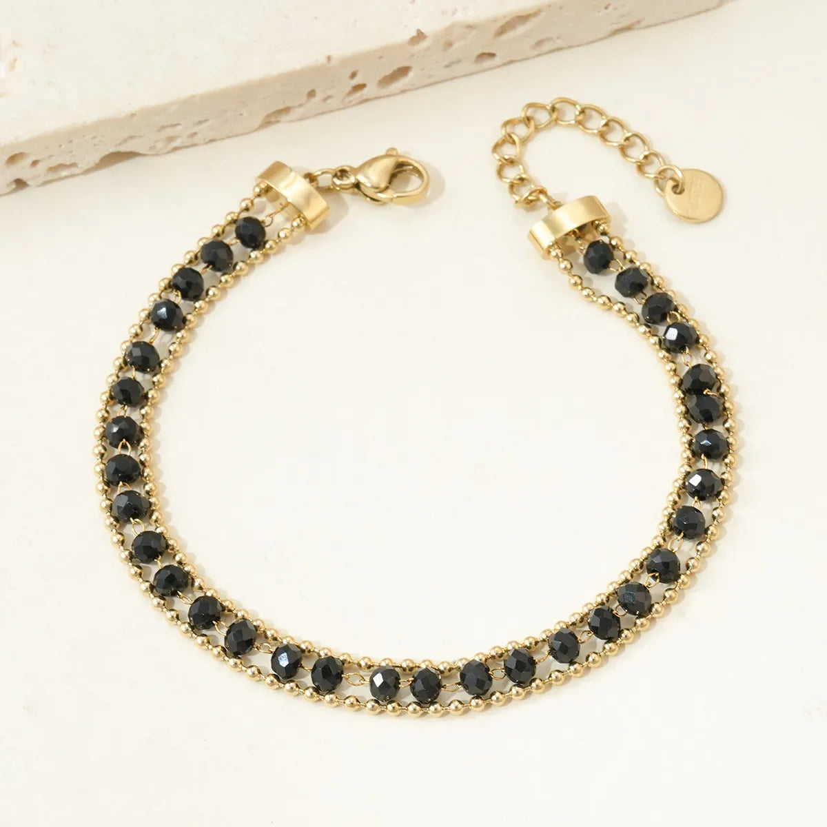 Pulseira de aço com contas pretas -w059