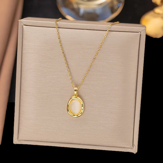 Κολιέ ατσάλι με χρυσό πλαίσιο-NE408