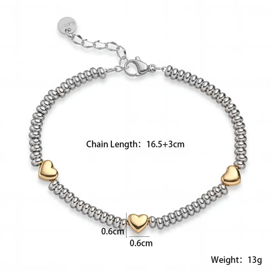 Βραχιόλι ατσάλι με χρυσές καρδιές-BR118