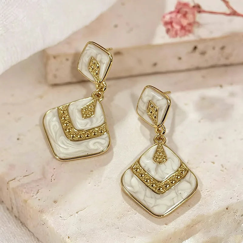 Steel earrings with white resin hearts - EA030