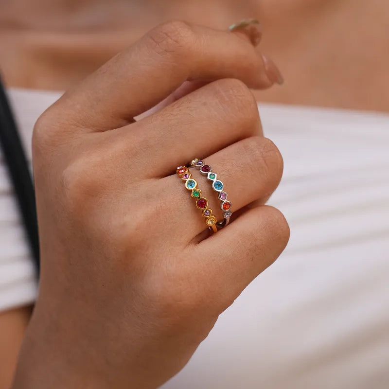 Anello triplo in acciaio dorato - R372