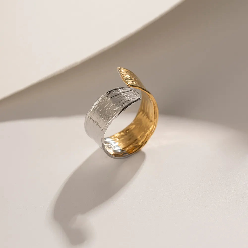 Steel ring in gold and silver with texture-R222