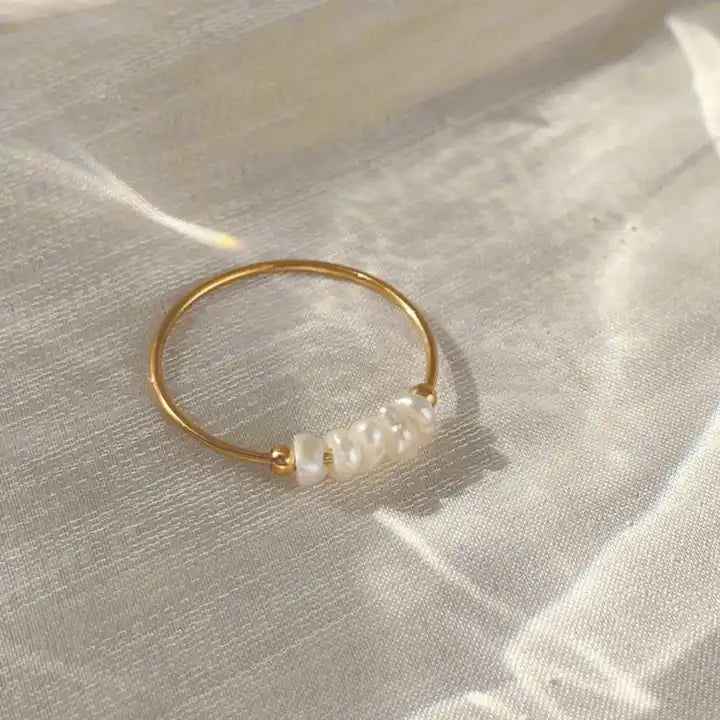 Thin steel ring with pearls - R104