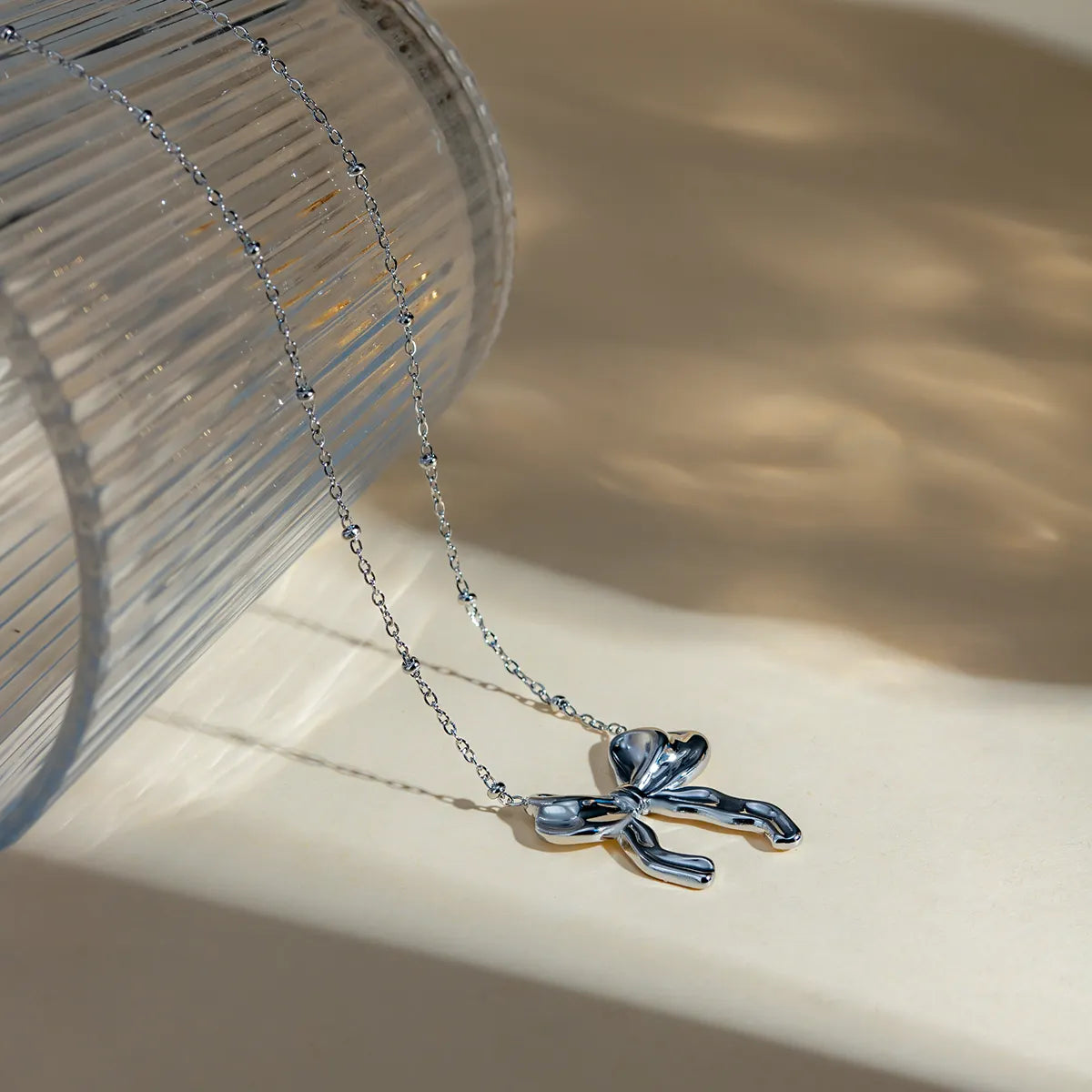 Steel necklace with bow - w299