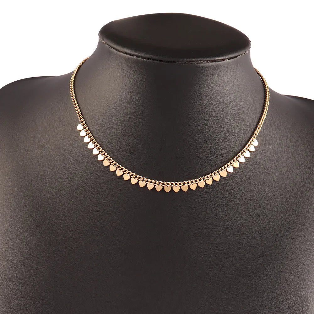 Collier en acier avec chaîne mince et coeurs d'or plats - NE052