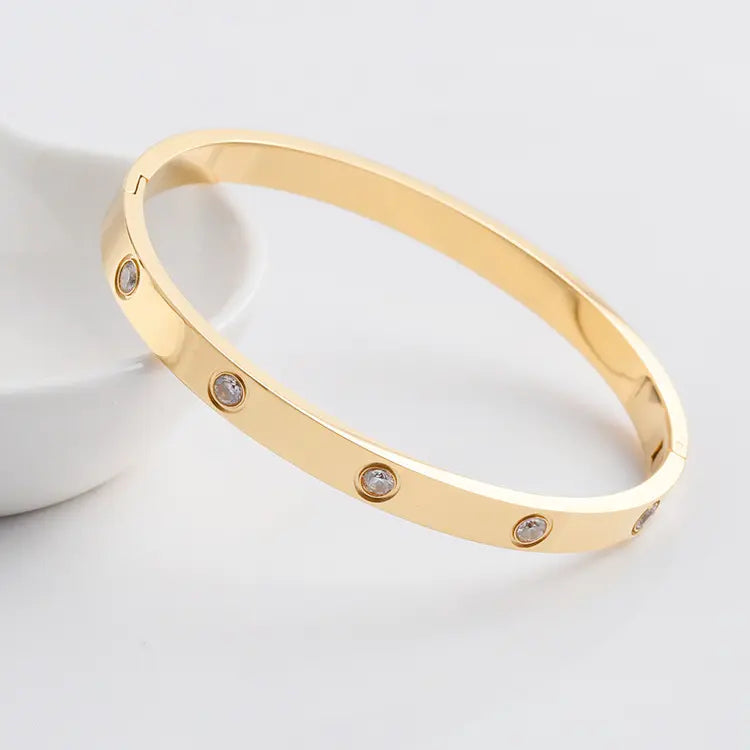 Gold steel handcuff bracelet with rhinestones - BR200