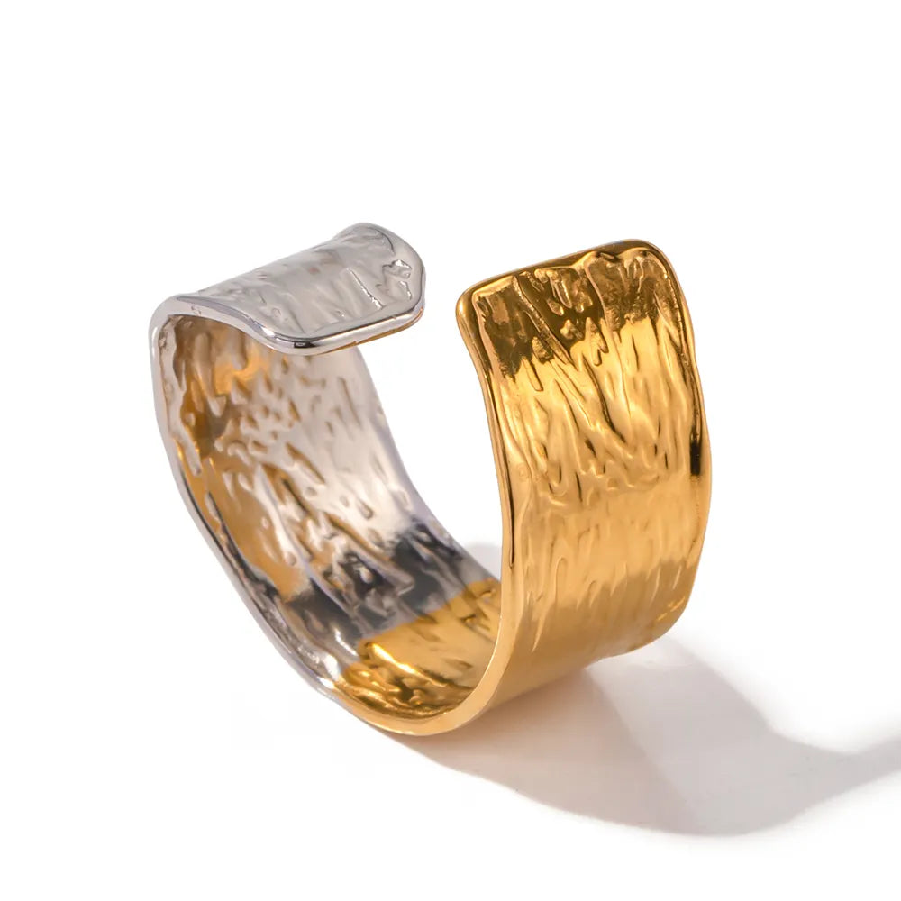 Steel ring in gold and silver with texture-R222