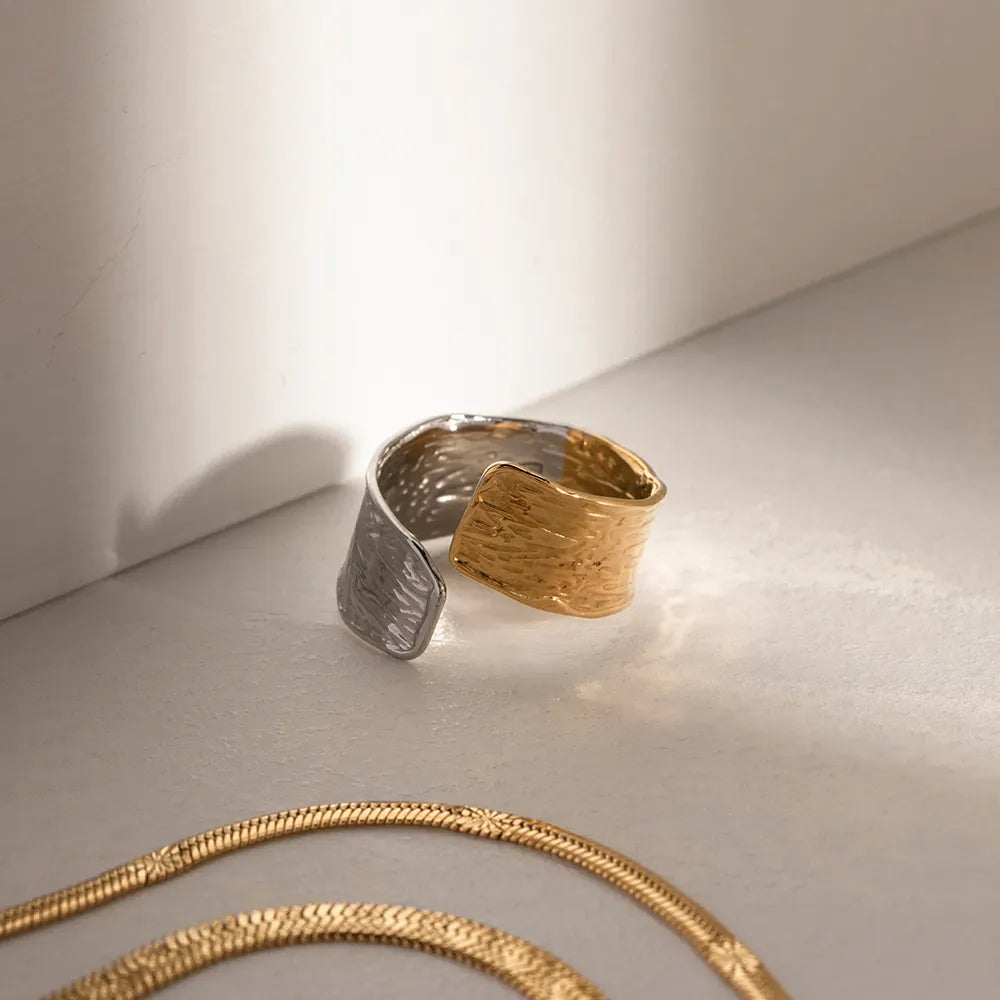 Steel ring in gold and silver with texture-R222