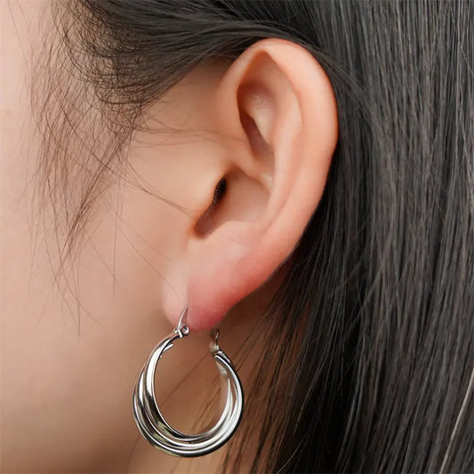 Boucles d'oreilles triple créoles en acier - w100