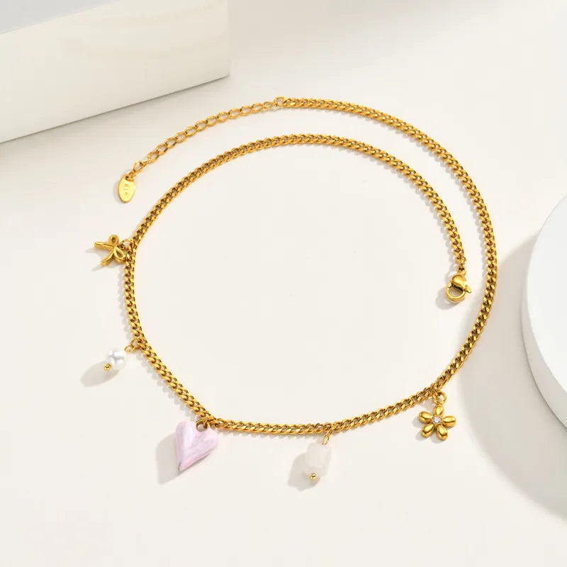 Κολιέ με ροζ καρδιά και charms - NE685