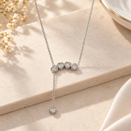Steel silver necklace with small zircon hearts - NE068