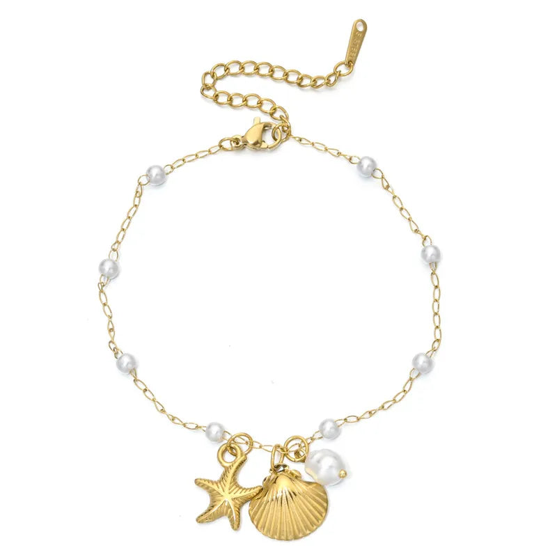 Βραχιόλι ατσάλινο με πέρλες και κοχύλια - br379