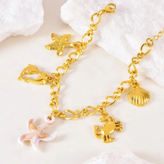 Bραχιόλι ατσάλινο χρυσό με charms - BR506