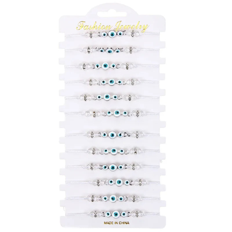 Σετ 12αδα βραχιόλια με διάφανα ματάκια - SET093