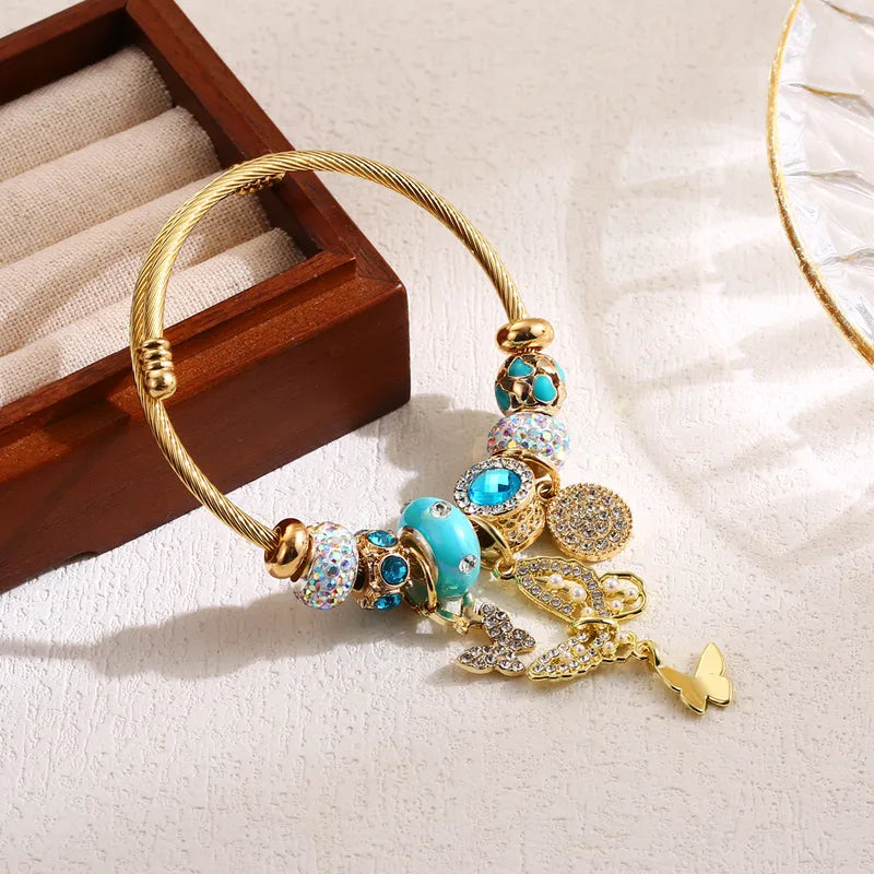 Brățară din oțel auriu cu fluture și talismane-BR488