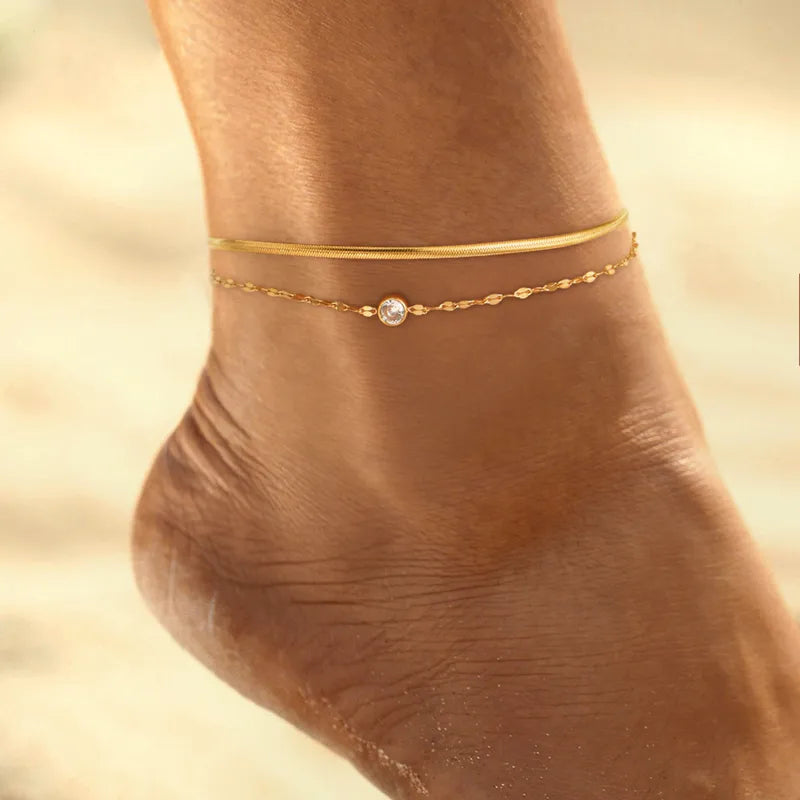 Βραχιόλι ποδιού χρυσό ατσάλι διπλό με zircon-AN043