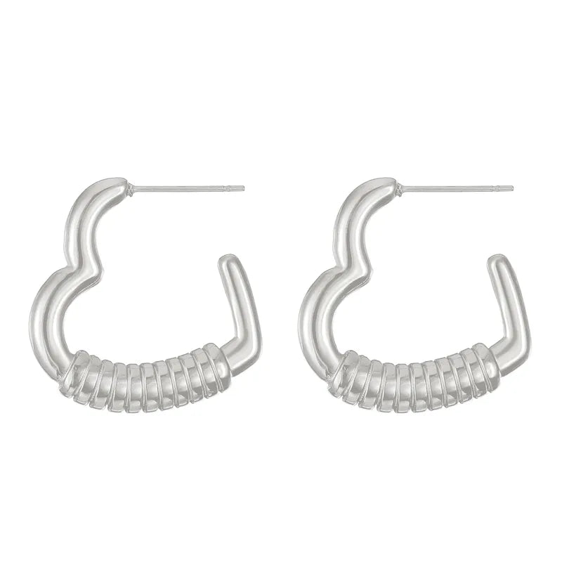 Earrings with a steel heart silver - EA408