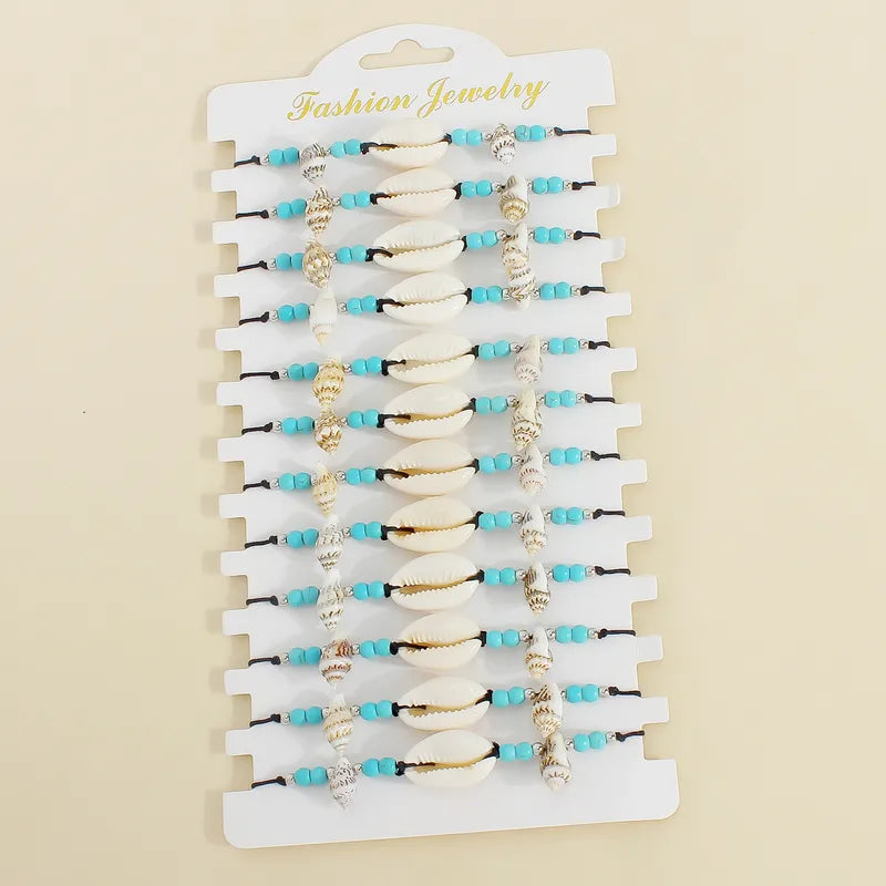 Σετ 12αδα βραχιόλια με κοχύλια - SET090