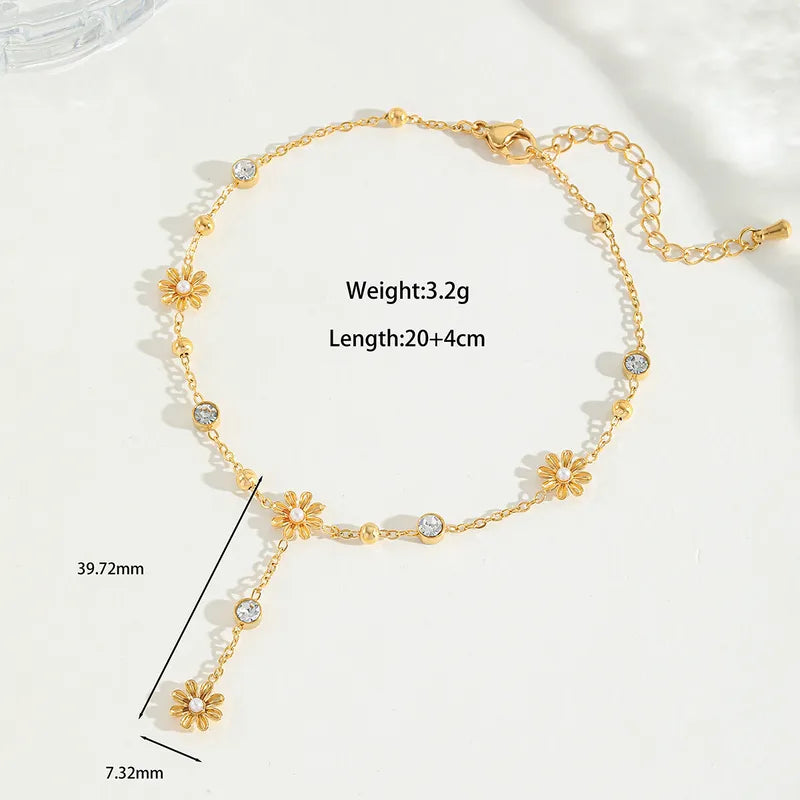 Foot bracelet gold steel with flowers and crystals