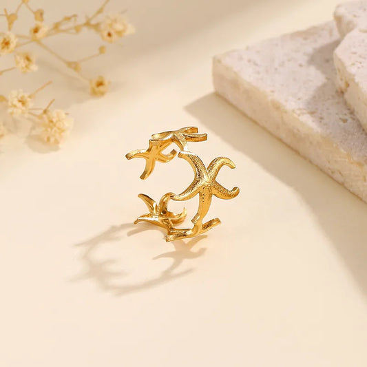 *Ring steel open with starfish-