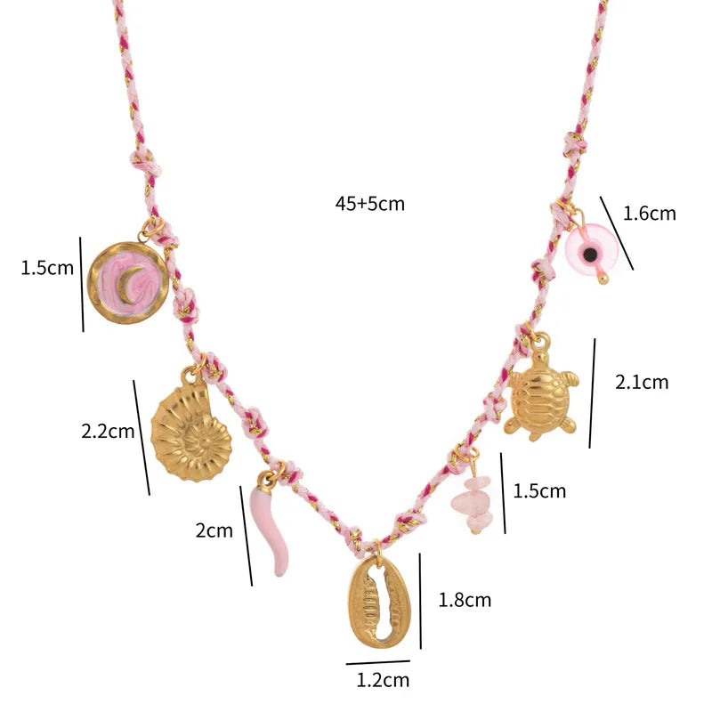 Necklace gilded steel with pink cord and gold charms-