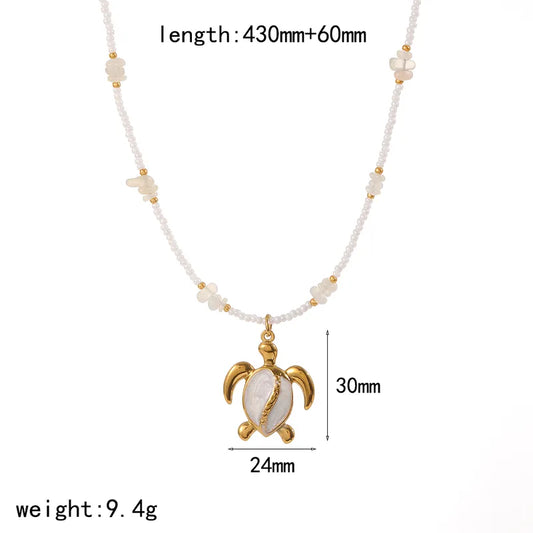 Κολιέ επιχρυσωμένο ατσάλι με λευκή χελώνα και χάντρες-