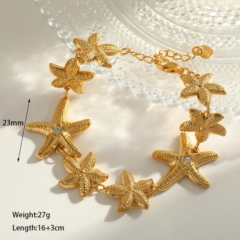 Βραχιόλι ατσάλι με αστερίες και στρας- BR429