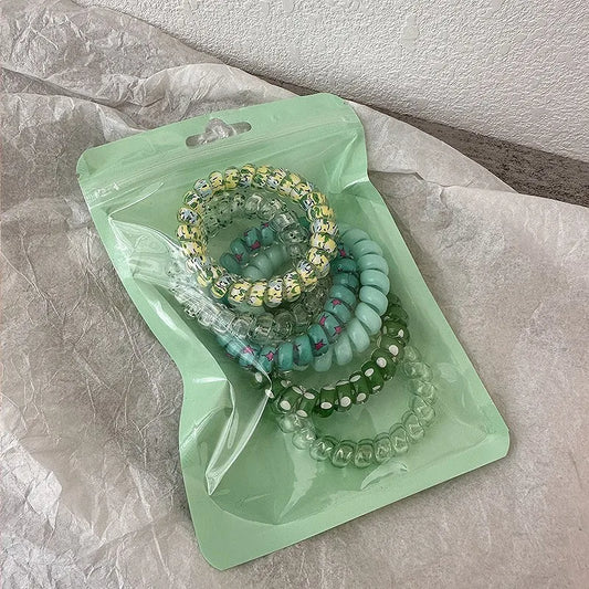 Λαστιχάκια πλαστικά σπιράλ σε σακουλάκι -6τμχ/set - HA056