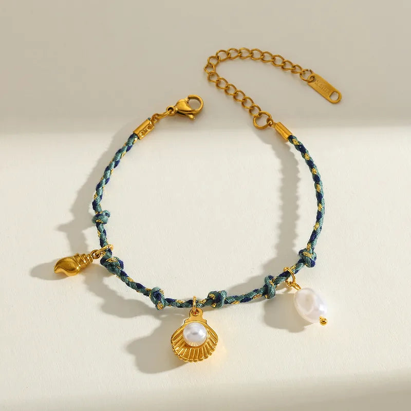 Βραχιόλι επιχρυσωμένο ατσάλι με μπλε κορδόνι και θαλάσσια μοτίβα - BR484