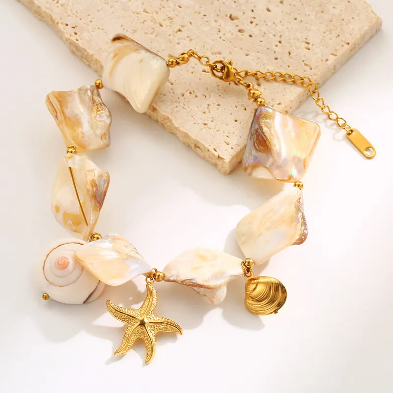 Bratara din otel auriu cu scoici mari-